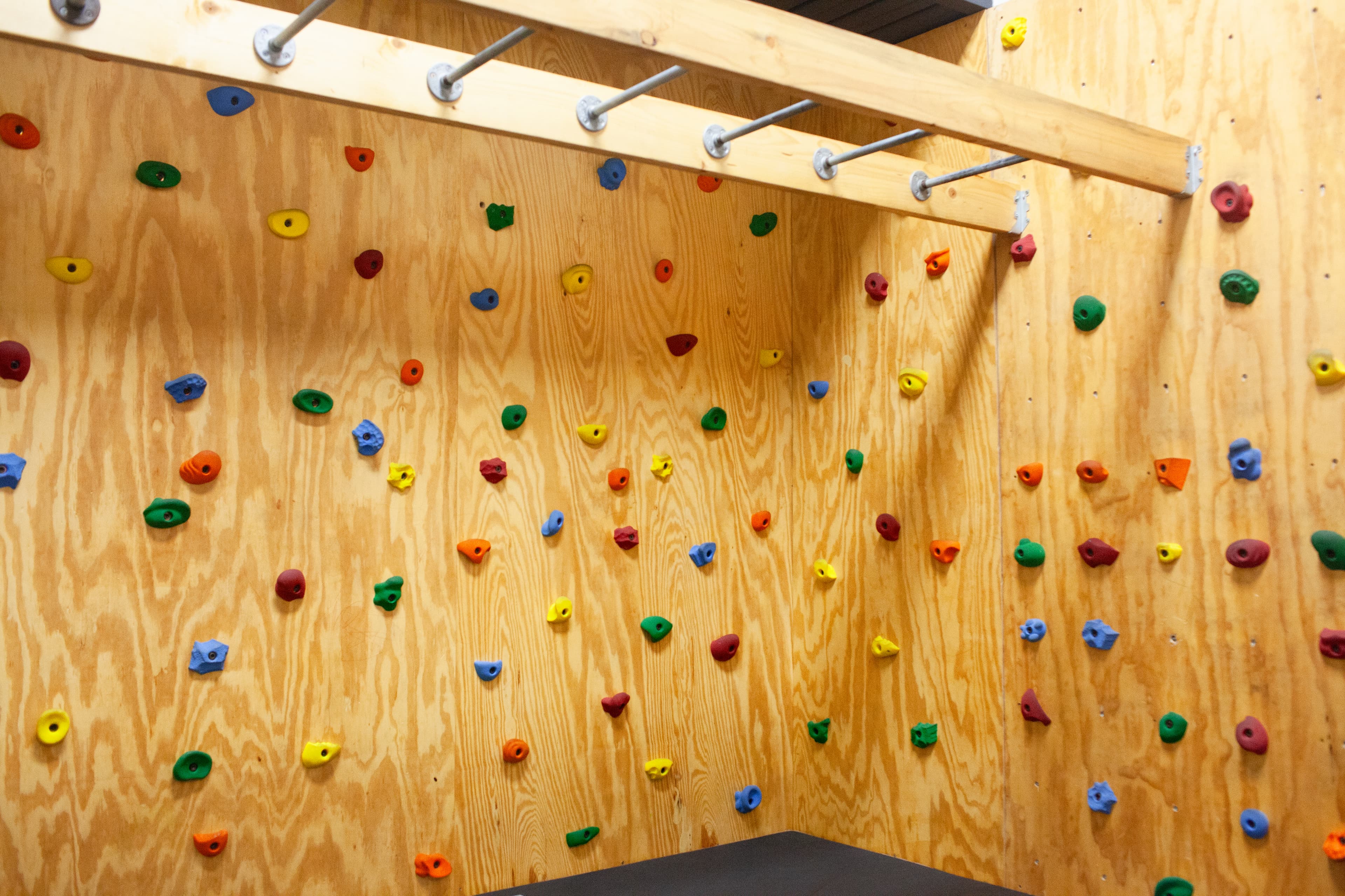 Kids climbing wall in the 2020FIT childcare area
